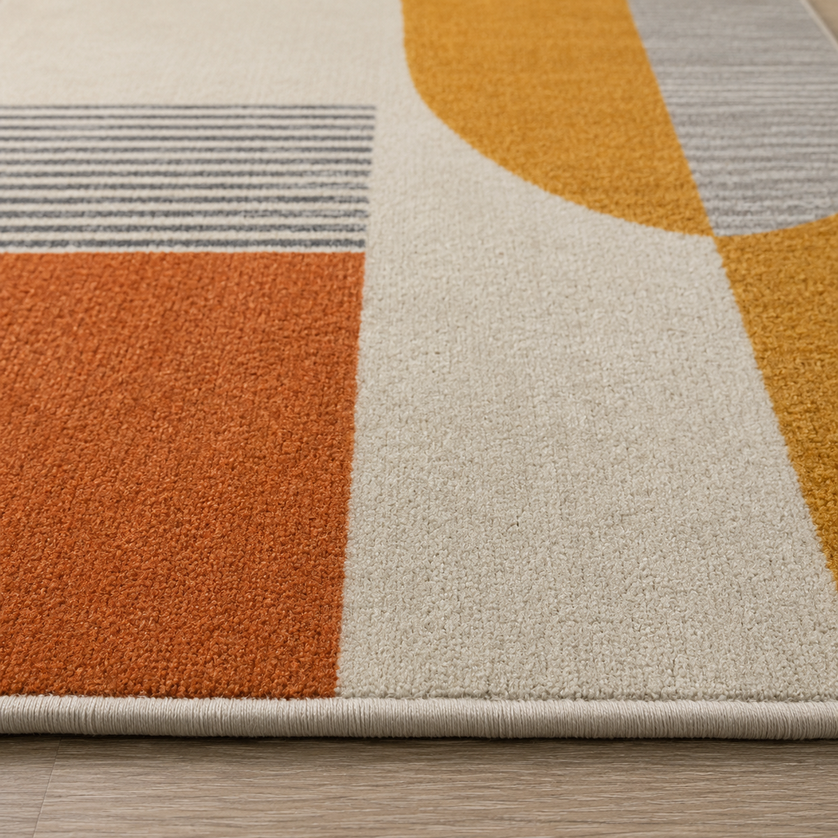Tapis rectangulaire Soren – style moderne – motif géométrique abstrait – écru, ocre doré, terracotta et gris perle